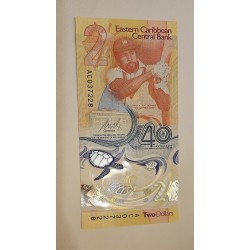Cédula Eastern Caribean 2 dólares polímero 40 anos banco central FE