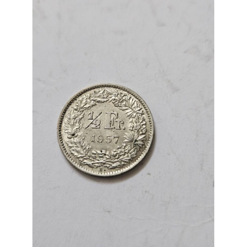 Moeda de Meio Franco da Suíça - 1957 - Helvetia e Grinalda de Louro