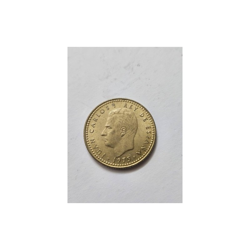 Adquira uma peça de história viva! Moeda de 1 Peseta da Espanha de 1975, o último ano do regime de Franco. Uma peça de transição